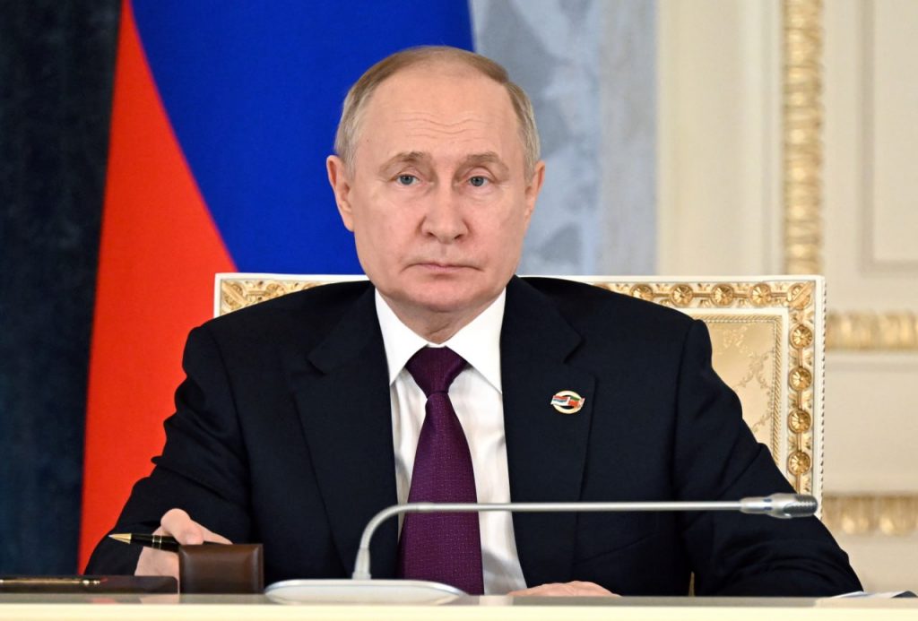 Путин
